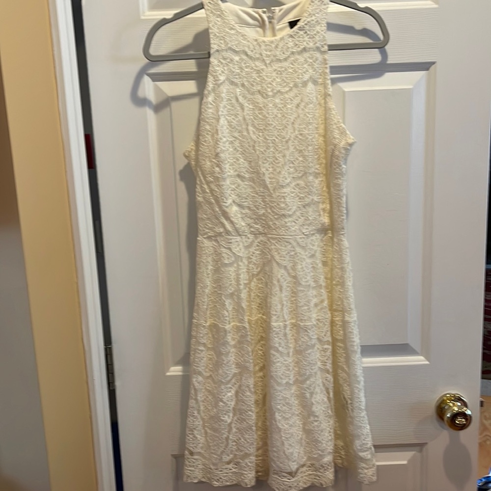 Like new cream lace dress size small.